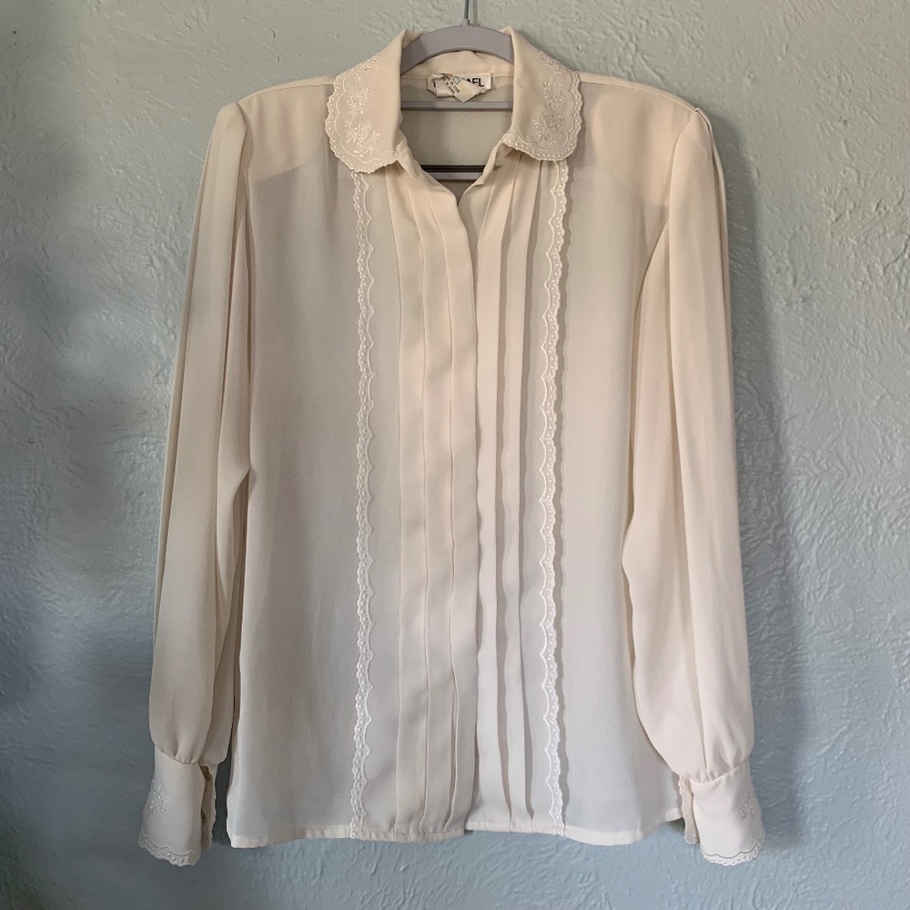 white frilly button up shirt